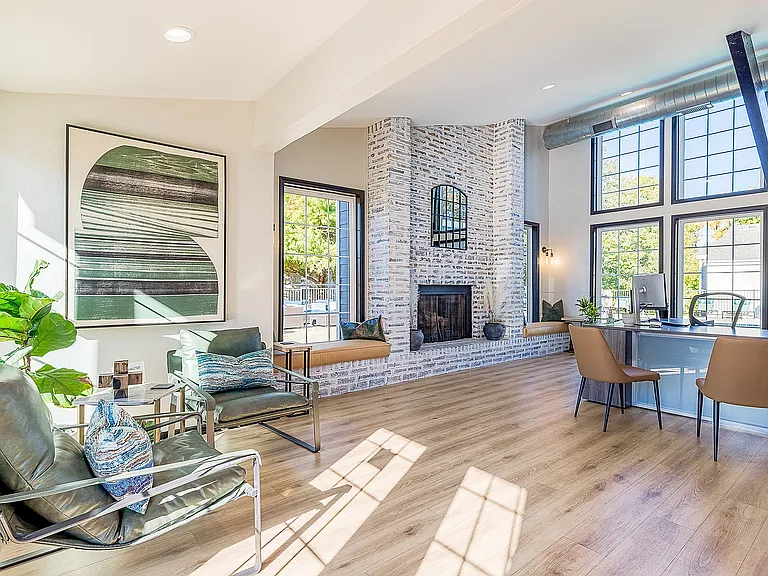 Newly Renovated Community Clubhouse with Fireplace and Large Windows