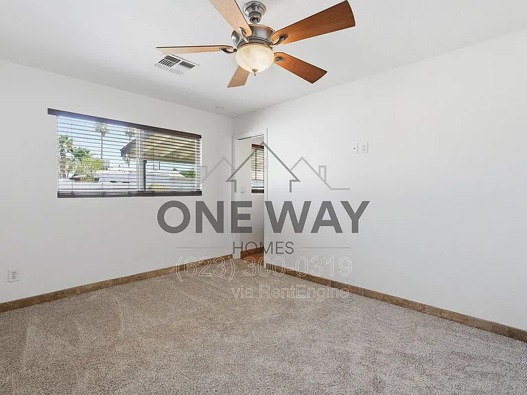 8702 E Sheridan St — Photo 18