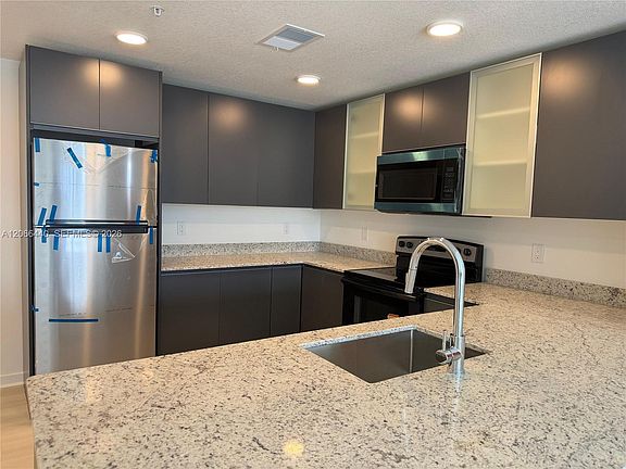 4th image of 5563 Millenia Park #201