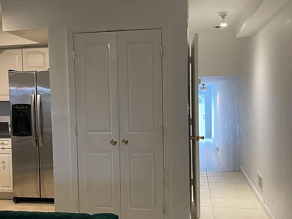 hallway to out side and closet for food