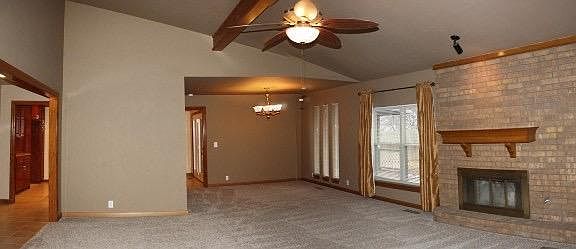 Spacious dining area, Wet Bar too! New wood blinds added.