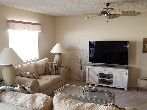 Open floor plan with 55" flat panel T.V.