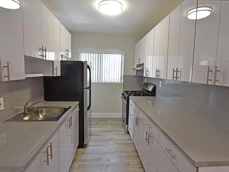 PLENTY OF CABINET SPACE IN KITCHEN