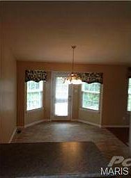 Bay window/door in Breakfast leads to patio
