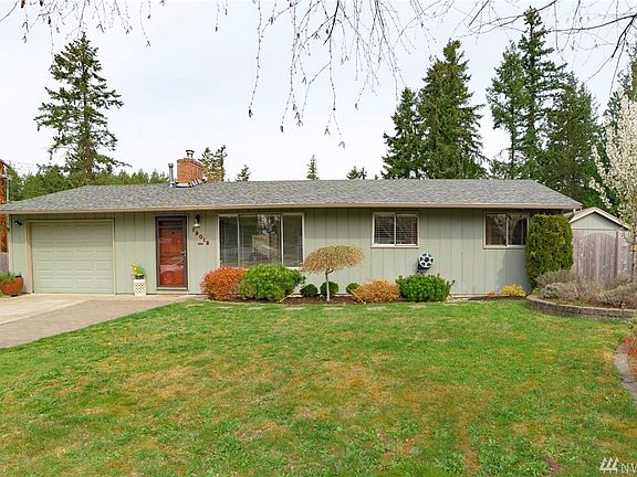 Charming rambler with flat front yard on a cul de sac.  New roof in 2013!