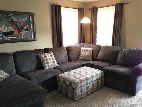 Large living room accomadates a variety of different furniture arragements for the new owners. New c