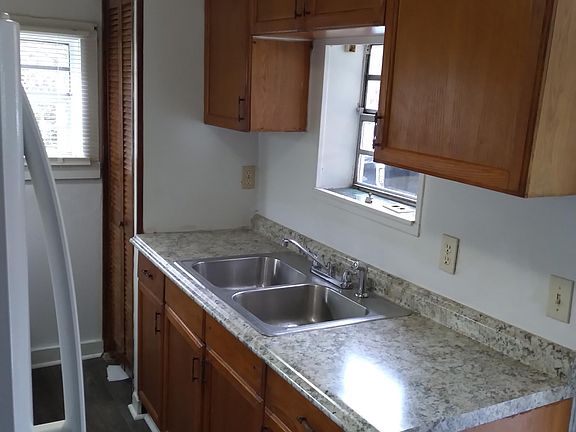 Kitchen countertop is brand new as are cabinets and refrigerator