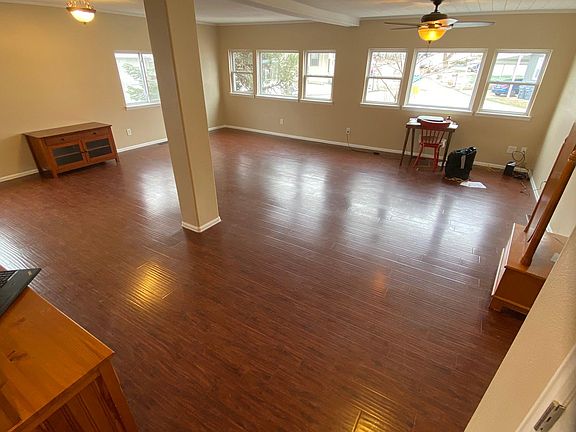 Huge living room + Dining area completely open with western windows looking out to the Golden Foothills 5 minutes away