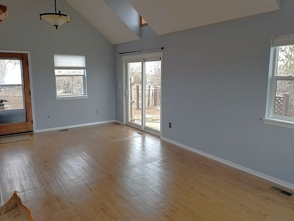 Living area adjacent to kitchen.