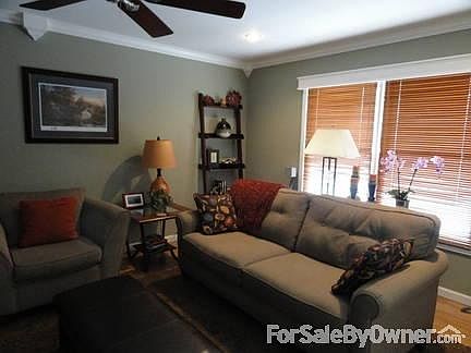 Family Room
						:
						Custom wood blinds/cornices & crown molding