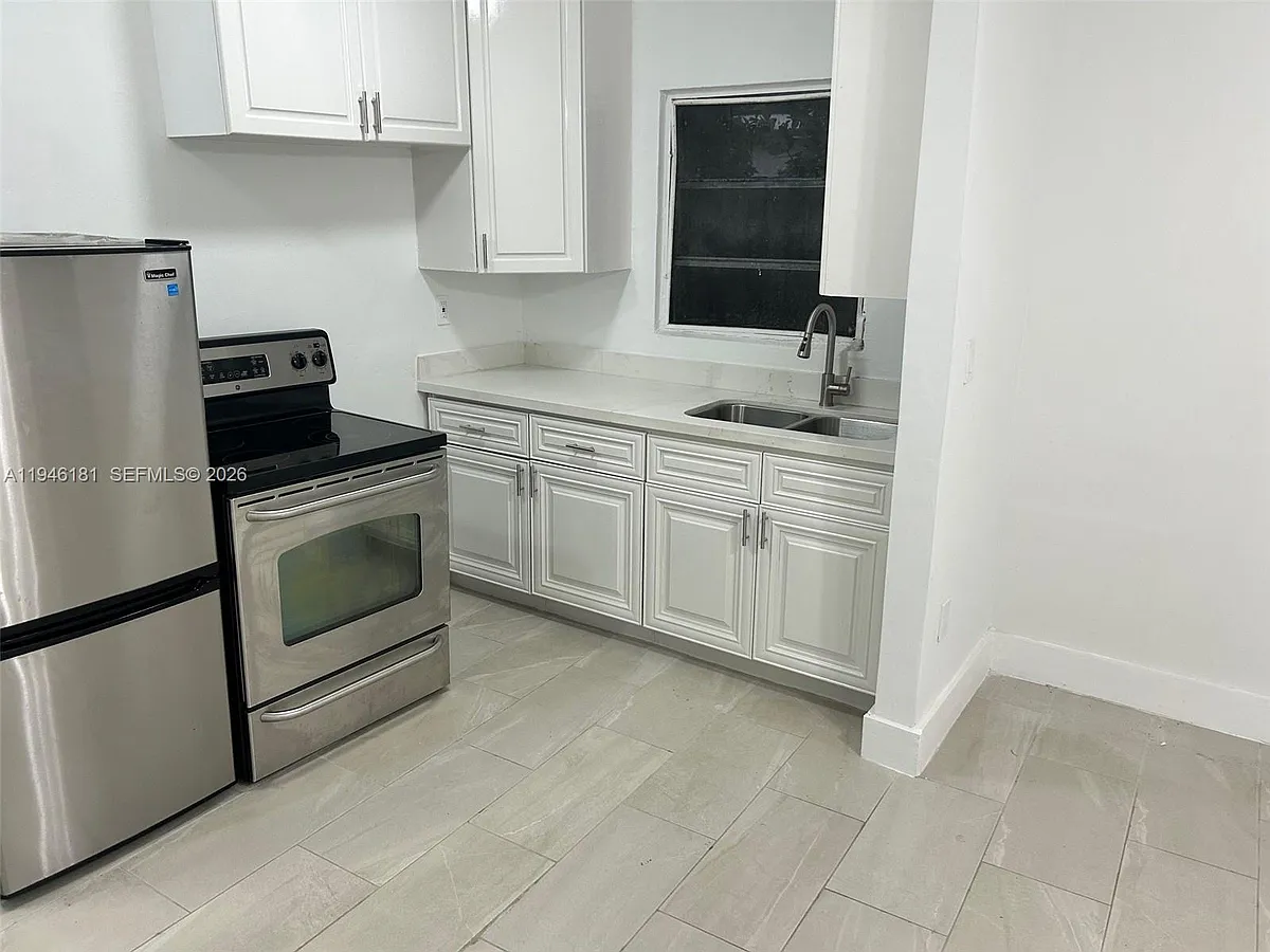 Photo 2 of 36 - 261 NW 49th St #C - Miami, FL Building Photo - 261 NW 49th St #C