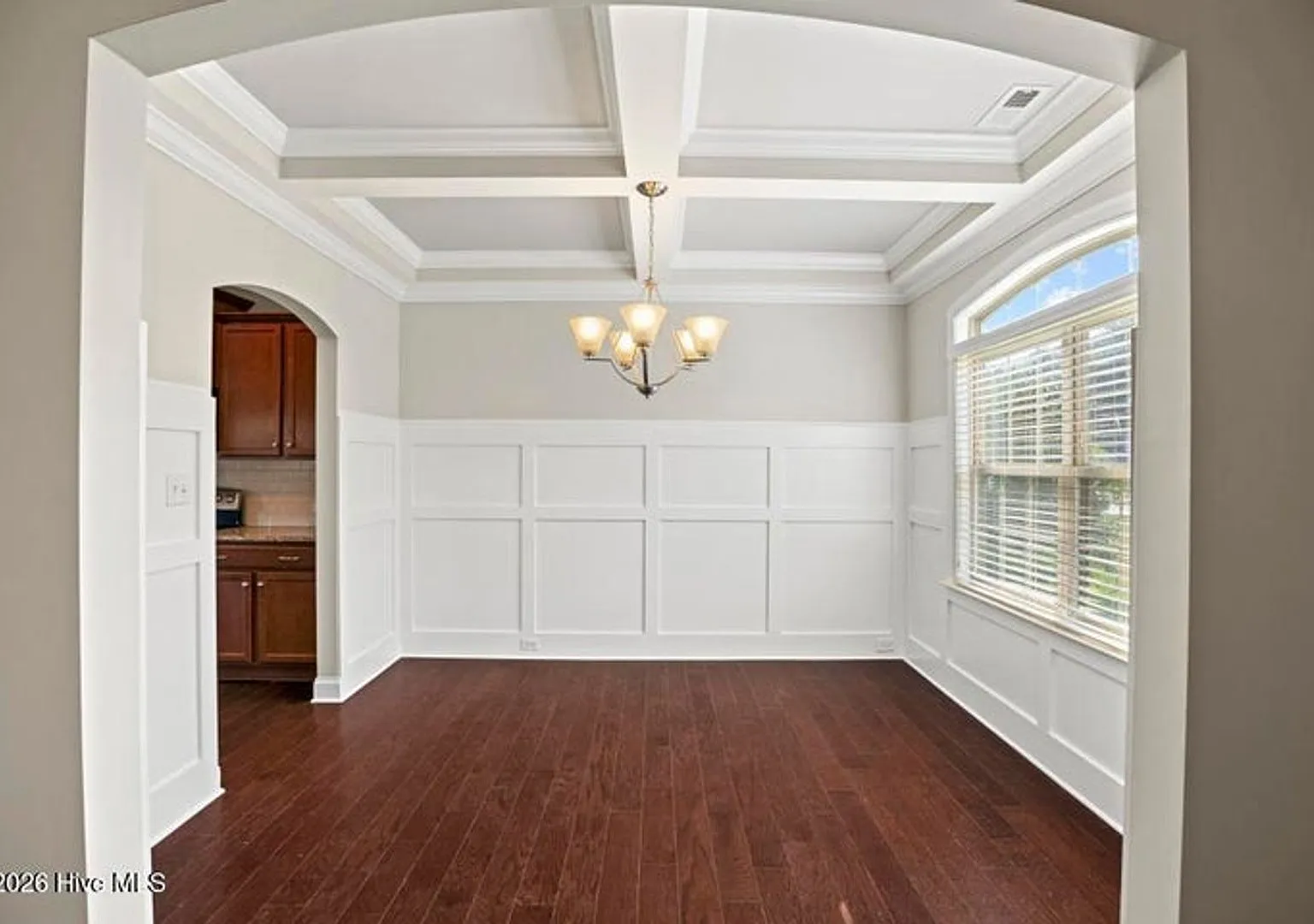 Set along a peaceful pond in the gated community of Mimosa Bay — Photo 4