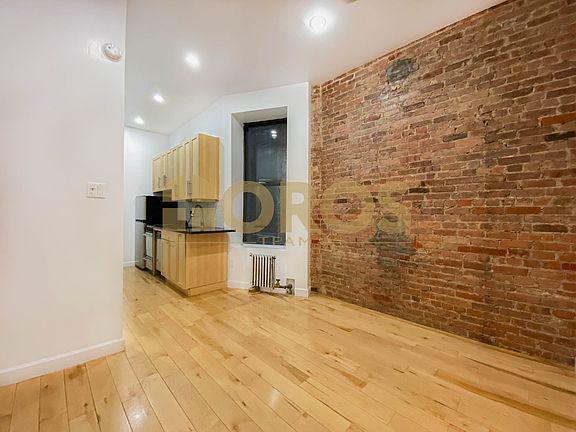 5th image of 217 E 10th St APT 4