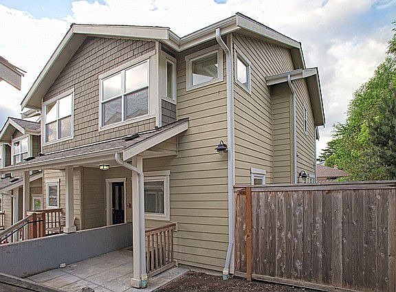 Seward Park Condominium-1200 square foot end unit with lots of windows for natural light! One of the