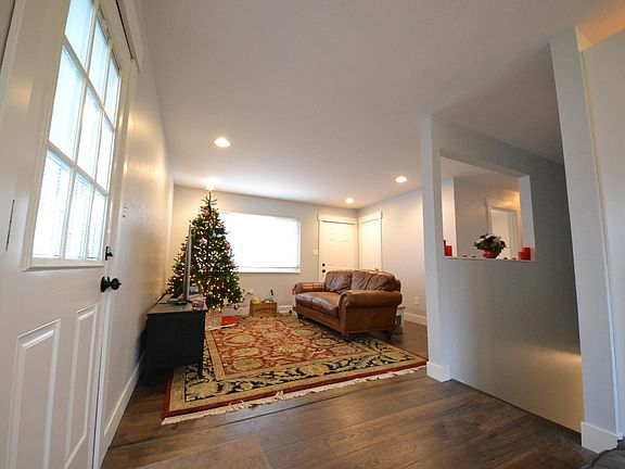 Brand New Flooring, Paint, and Trim Throughout