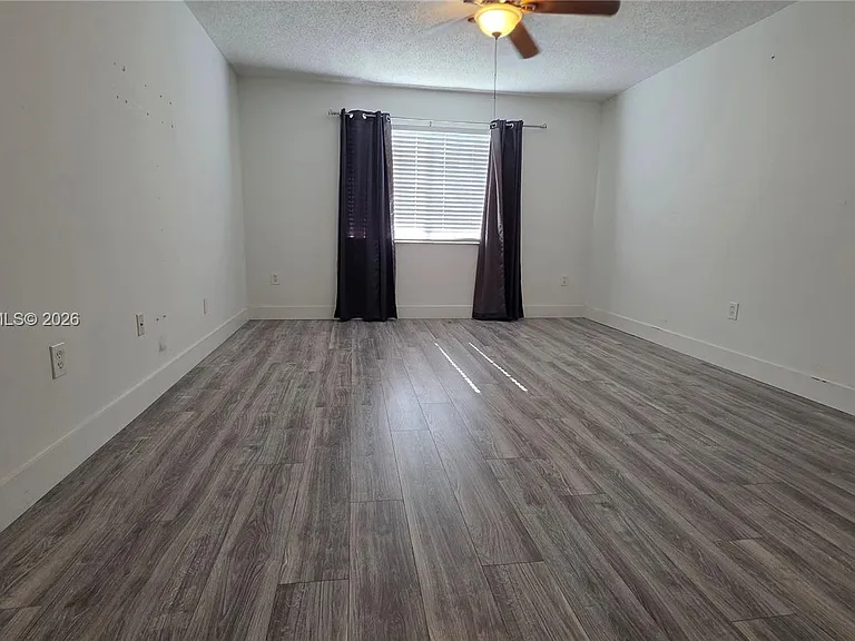 5011 Wiles Rd #203 — Photo 5