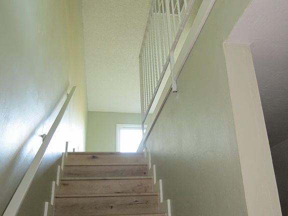 to upstairs where livingroom and kitchen are.