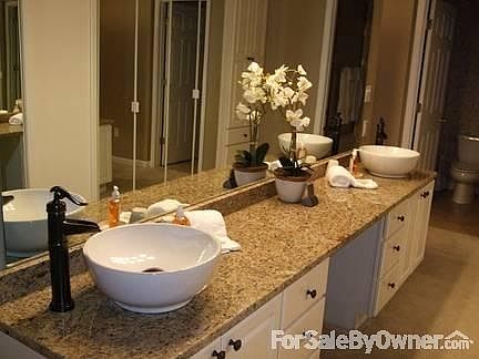 Master Bath Area
						:
						Master bath has granite counter, vessel sinks, lots of closet space, jetted tub