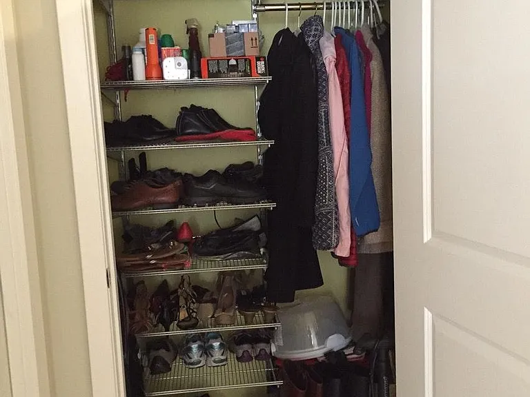 Coat closet near front door (Elfa closeting system installed