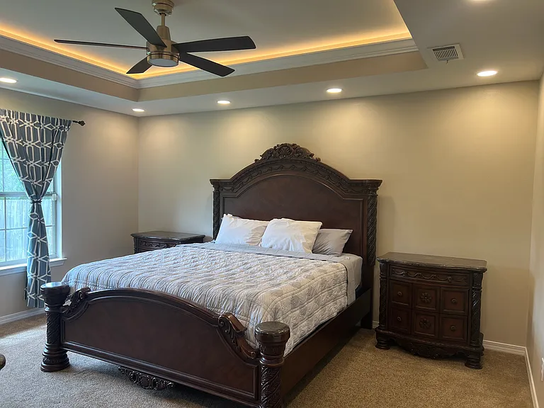 Owner Suite Bedroom with recess, lighting, as well as a coffered lighting in the Crawford ceiling