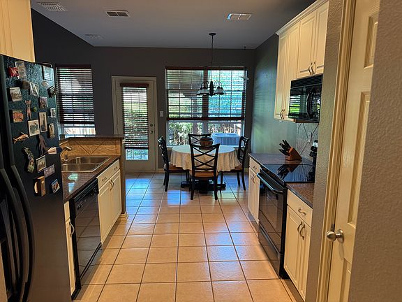 Kitchen area looking out back patio