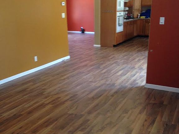Laminate flooring throughout