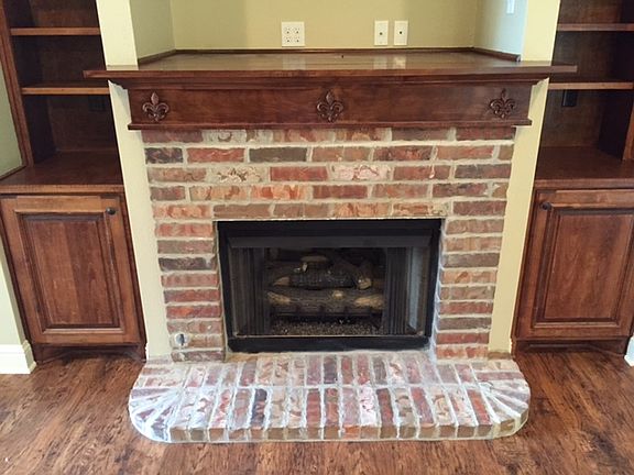 Gas log fire place/built ins