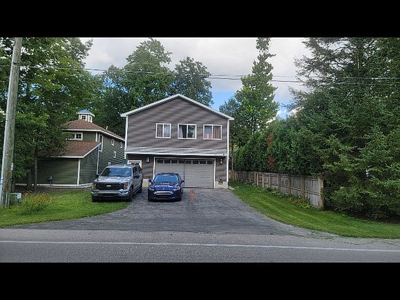 ! free parking space to the right and room behind that space possibly for 1 added car.