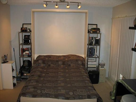 Queen size Murphy bed. No you see, later you don't.