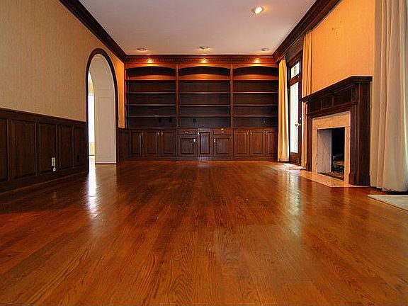 Handsome Library w/fireplace & French Doors to Terrace