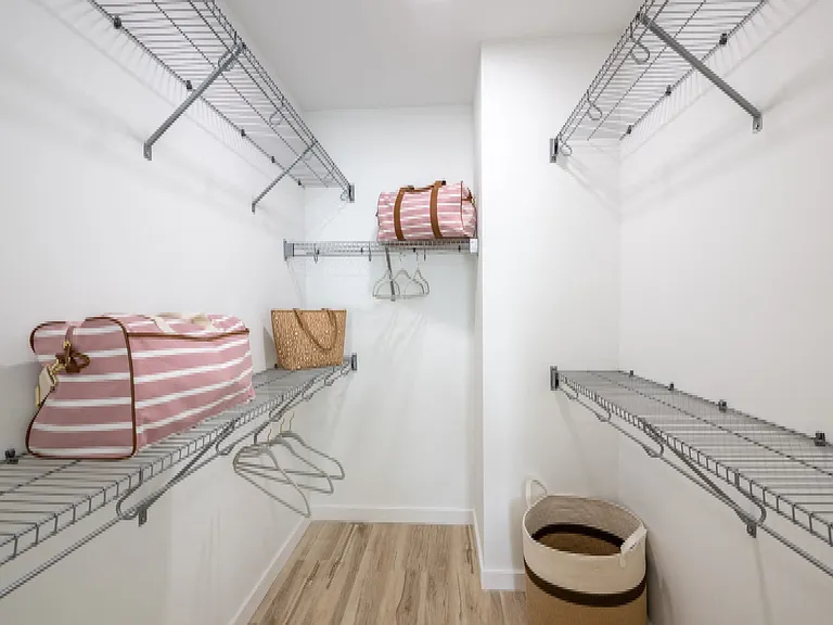 Large walk-in closets provide plenty of storage space.