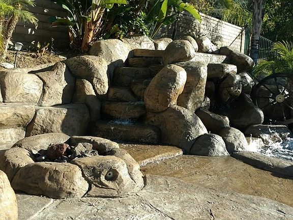 Firepit with seating, spa on the right