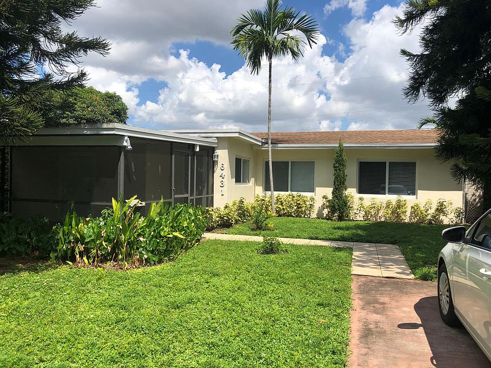 Street view with screened in carport