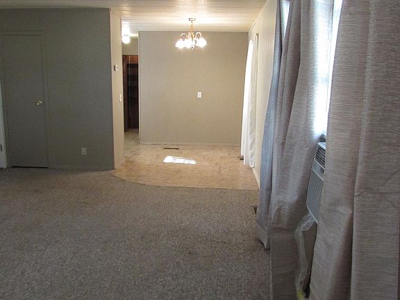 Open eat in kitchen and living room.