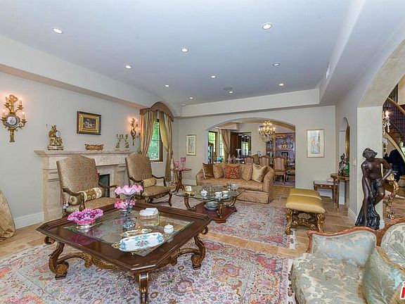 formal living room with recessed lighting and window facing the beautiful front yard, and contiguous with the formal dining room