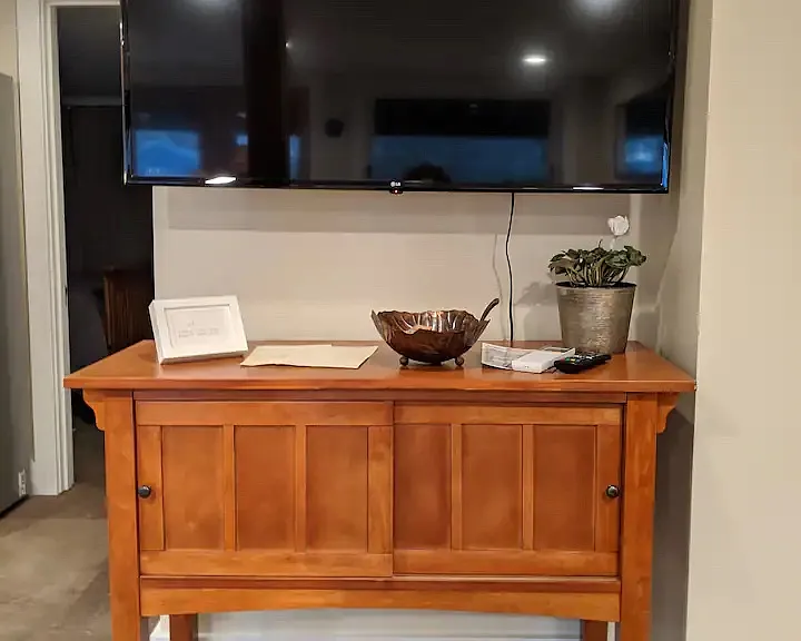 Large smart TV included.