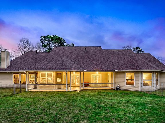 Abundance of windows provide excellent views of the property in the back -