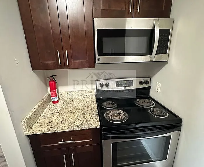 6045 Barton St — Photo 8