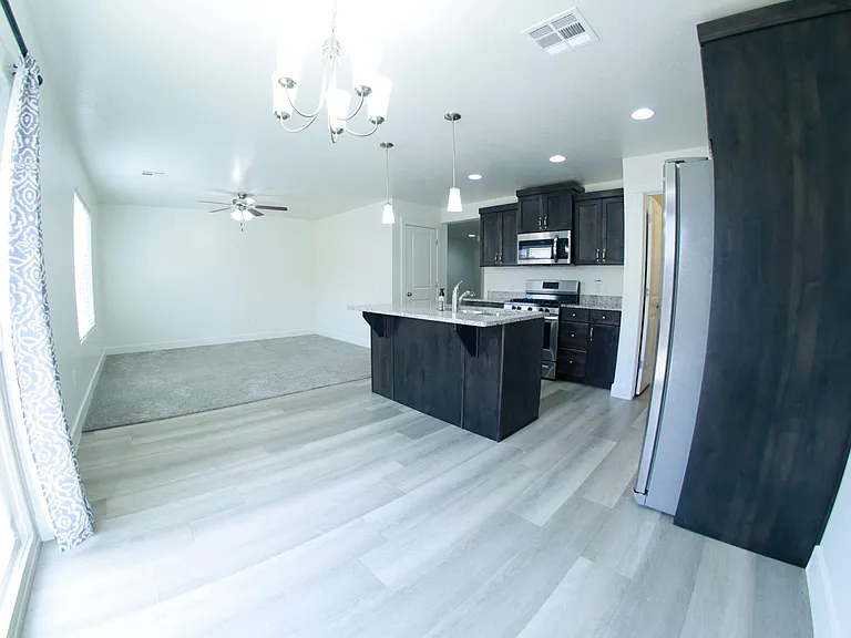 Dining Room/Kitchen view into Family Room