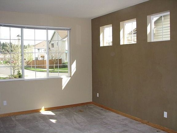 Nice Living Room with Creative use of Windows