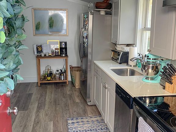 Enter into the apartment and you are in the kitchen. Newer stainless appliances with disposal and dishwasher.