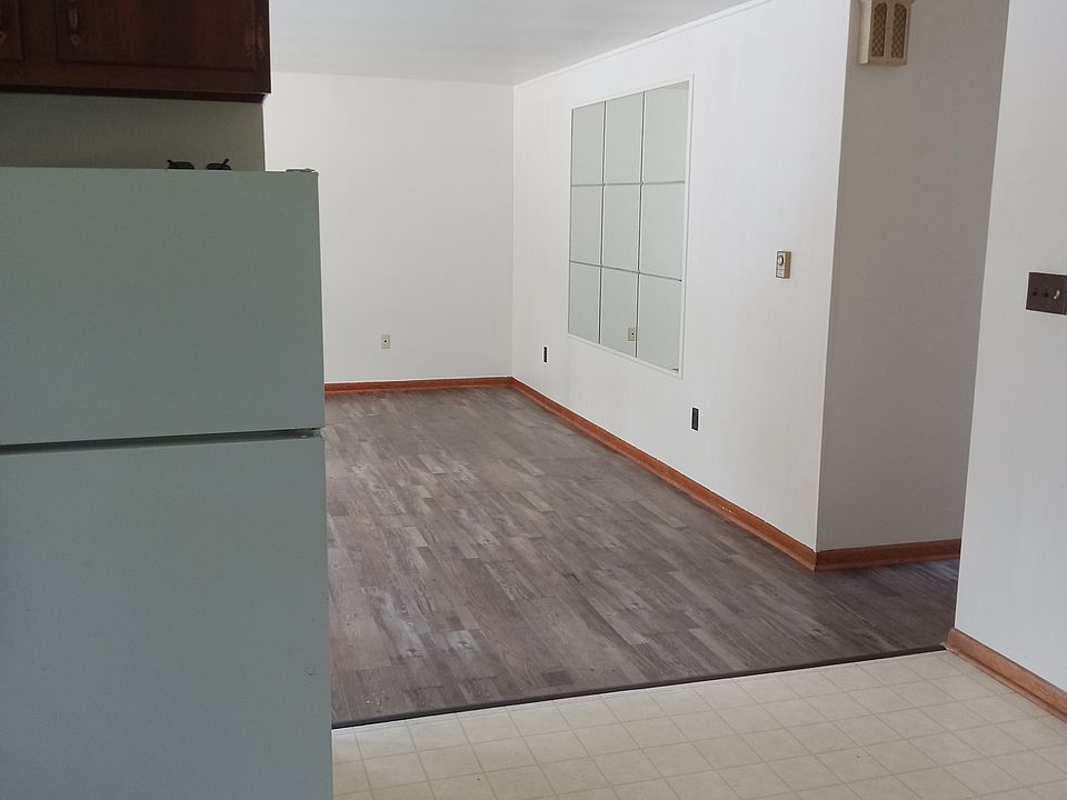 In the kitchen, looking at living room.