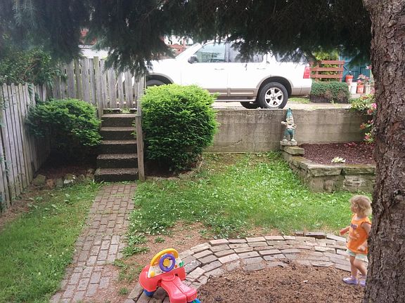 Back yard and parking area