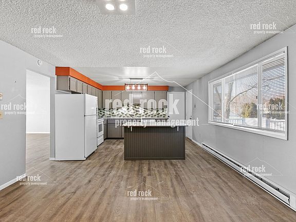 5th image of 3423 E 57th Ave