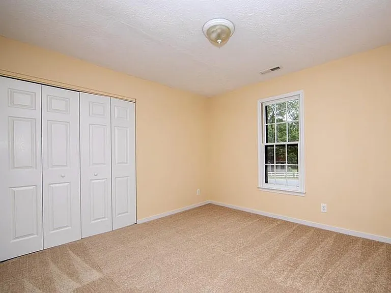 3rd bedroom. This window was replaced with a Pella double-pane window in 2024.