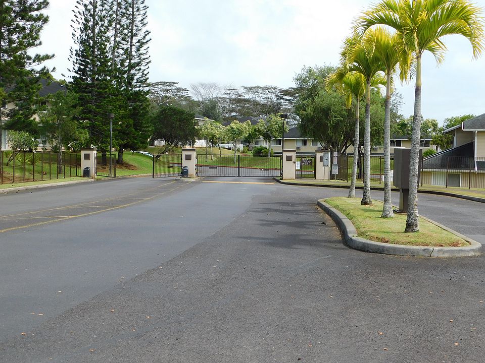 Gated community in lower Mililani Mauka. Call box with local phone numbers.