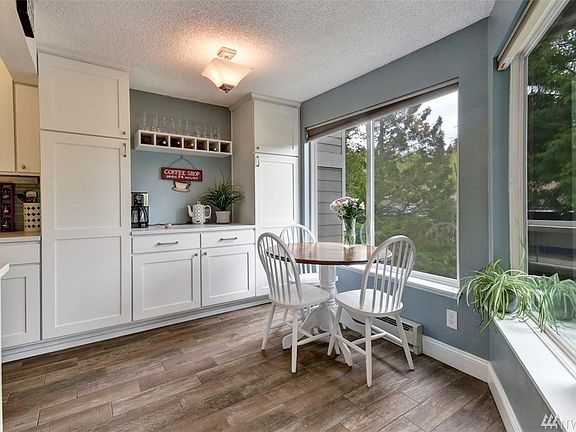 This kitchen was extended to include the coffee/wine bar with two pantries storage areas, making the kitchen larger and more useable than any other in the development