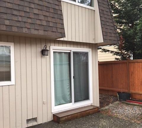 Back of town house with bedroom above and slider off kitchen