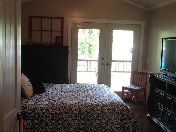 Bedroom w/ lake view