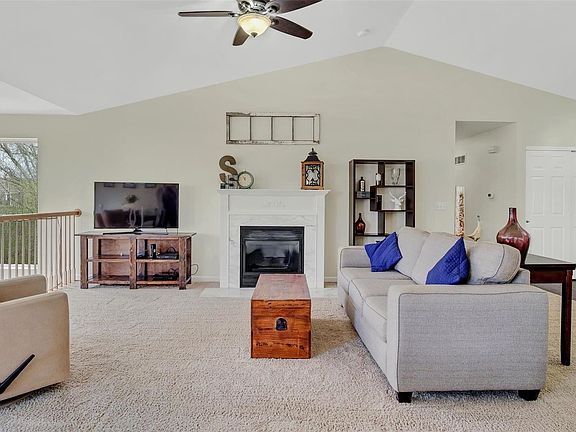 Vaulted great room has vent less gas fireplace.